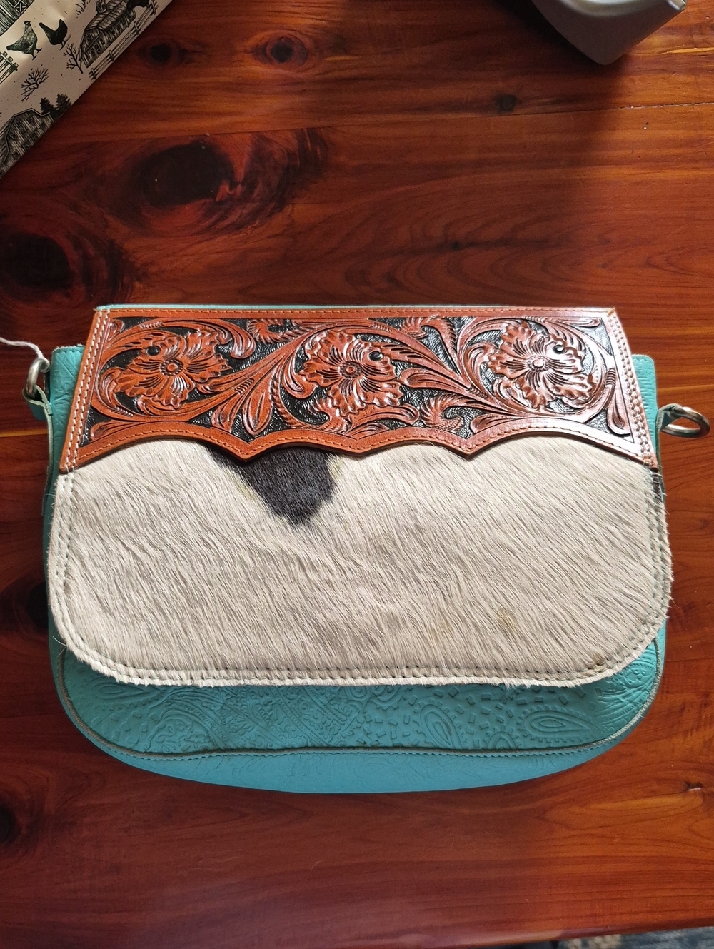 Turquoise & Cowhide Crossbody Bag with Flap Closure